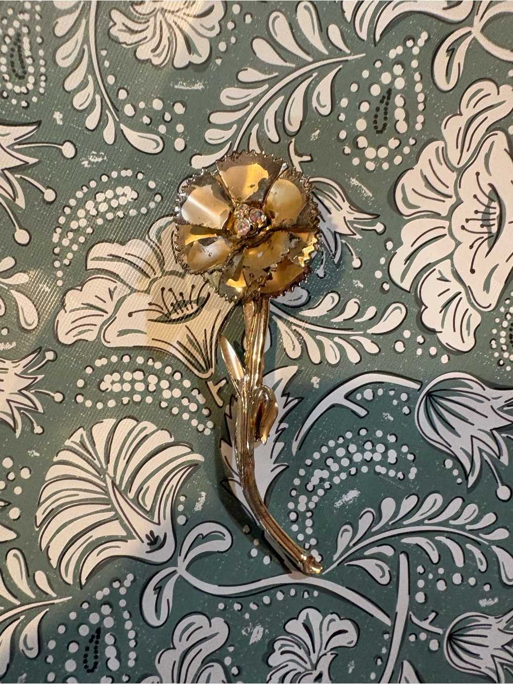 Gold Floral Stem Brooch with Crystal Center
